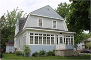 719 N ASHLAND AVE, a Dutch Colonial Revival house, built in Green Bay, Wisconsin in 1920.