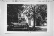 703-703A S 15TH ST, a Greek Revival house, built in Manitowoc, Wisconsin in 1874.