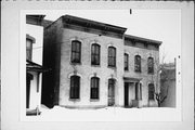 709 FRANKLIN ST, a Italianate duplex, built in Manitowoc, Wisconsin in 1877.