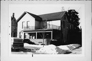 704-704A HAMILTON ST, a Gabled Ell house, built in Manitowoc, Wisconsin in 1898.