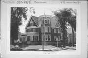 823 HAMILTON ST, a Queen Anne house, built in Manitowoc, Wisconsin in 1905.