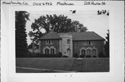 212 HURON ST, a English Revival Styles house, built in Manitowoc, Wisconsin in 1928.