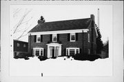 1122 LINCOLN BLVD, a Colonial Revival/Georgian Revival house, built in Manitowoc, Wisconsin in 1940.
