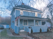 212 N. McKenzie Ave., a American Foursquare house, built in Gillett, Wisconsin in 1912.