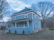212 N. McKenzie Ave., a American Foursquare house, built in Gillett, Wisconsin in 1912.