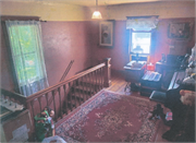 212 N. McKenzie Ave., a American Foursquare house, built in Gillett, Wisconsin in 1912.