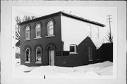 701 MARSHALL ST, a Italianate small office building, built in Manitowoc, Wisconsin in 1854.