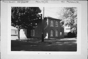 701 MARSHALL ST, a Italianate small office building, built in Manitowoc, Wisconsin in 1854.