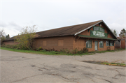 406 N Lake Ave, a Rustic Style lumber yard/mill, built in Crandon, Wisconsin in 1932.