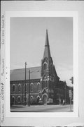 502 N 8th St, a Early Gothic Revival church, built in Manitowoc, Wisconsin in 1870.