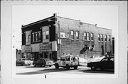 1001-1003 WASHINGTON ST, a Neoclassical/Beaux Arts large retail building, built in Manitowoc, Wisconsin in 1905.