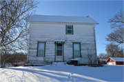 1907 Hawkinson Rd, a Gabled Ell house, built in Dunn, Wisconsin in 1870.