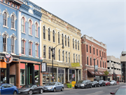 110 S 3RD ST, a Italianate large retail building, built in La Crosse, Wisconsin in 1874.