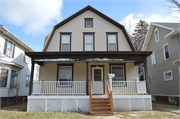 1419 Carlisle Ave., a Dutch Colonial Revival house, built in Racine, Wisconsin in 1904.