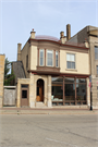 214 N 6th Ave, a Italianate retail building, built in West Bend, Wisconsin in 1898.
