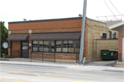 308 - 310 N Main St, a Commercial Vernacular large retail building, built in West Bend, Wisconsin in 1916.