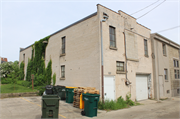 519 Hickory St (rear), a Astylistic Utilitarian Building warehouse, built in West Bend, Wisconsin in 1905.