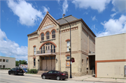 N WATER ST, a Romanesque Revival opera house/concert hall, built in New London, Wisconsin in 1894.