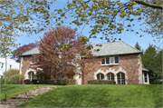 212 HURON ST, a English Revival Styles house, built in Manitowoc, Wisconsin in 1928.