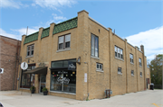 807 N 8th St, a Spanish/Mediterranean Styles retail building, built in Manitowoc, Wisconsin in 1931.