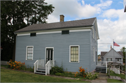 MILWAUKEE ST, a Greek Revival house, built in Theresa, Wisconsin in 1847.