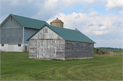 N1676 STH 60, a Front Gabled corn crib, built in Arlington, Wisconsin in 1900.