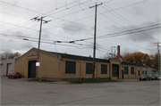 404 N Henry St, a Commercial Vernacular garage, built in Green Bay, Wisconsin in 1937.