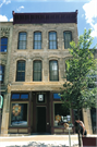 117 E MAIN ST, a Italianate bakery, built in Madison, Wisconsin in 1875.