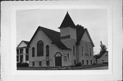 902 ELIZABETH AVE, a Romanesque Revival church, built in Marinette, Wisconsin in 1899.