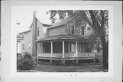 1826 LIBERTY ST, a Cross Gabled house, built in Marinette, Wisconsin in 1875.