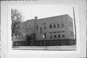 SW SIDE OF PINE ST BETWEEN JACKSON ST & HOCKRIDGE ST, a Romanesque Revival school – elem/middle/jr high/high, built in Marinette, Wisconsin in 1898.