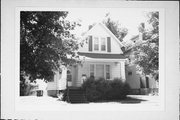1937 STEPHENSON, a Cross Gabled house, built in Marinette, Wisconsin in 1911.