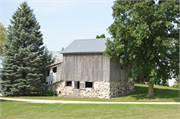 W4875 CTH O, a Astylistic Utilitarian Building granary, built in Plymouth, Wisconsin in 1870.
