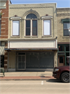144 E MAIN ST, a Commercial Vernacular small retail building, built in Stoughton, Wisconsin in .