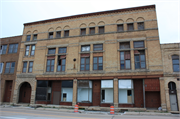 909-913 S MAIN ST, a Romanesque Revival large retail building, built in Oshkosh, Wisconsin in 1902.