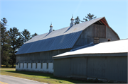 W665 County Road P, a Astylistic Utilitarian Building basement barn, built in Washington, Wisconsin in 1930.