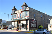 4TH ST, 421, a Queen Anne retail building, built in Algoma, Wisconsin in 1902.