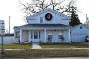 118 W STATE ST, a Greek Revival house, built in Fox Lake, Wisconsin in 1850.