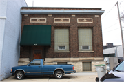 313 S WATER ST, a Neoclassical/Beaux Arts small office building, built in Milwaukee, Wisconsin in 1914.