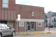 149 S Walnut St, a Commercial Vernacular retail building, built in Reedsburg, Wisconsin in 1924.