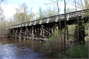 Oconto River State Trail over Little River, a NA (unknown or not a building) bridge, built in Stiles, Wisconsin in 1882.