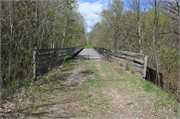 Oconto River State Trail over Little River, a NA (unknown or not a building) bridge, built in Stiles, Wisconsin in 1882.