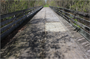 Oconto River State Trail over Little River, a NA (unknown or not a building) bridge, built in Stiles, Wisconsin in 1882.