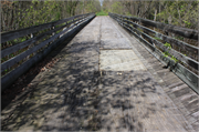 Oconto River State Trail over Little River, a NA (unknown or not a building) wood bridge, built in Stiles, Wisconsin in 1882.