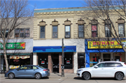 218 E COLLEGE AVE, a Italianate retail building, built in Appleton, Wisconsin in 1873.