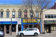220 E COLLEGE AVE, a Italianate retail building, built in Appleton, Wisconsin in 1873.