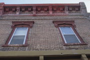 117 E OAK ST, a Italianate small retail building, built in Sparta, Wisconsin in 1890.