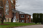 126 Peterson Ave, a Late Gothic Revival house of worship, built in Blair, Wisconsin in 1907.