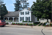 W63 N627 WASHINGTON AVE, a Greek Revival house, built in Cedarburg, Wisconsin in 1849.