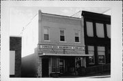 809 MAIN, a Commercial Vernacular small retail building, built in Cashton, Wisconsin in 1900.